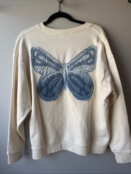 Tricia Fix Tops - Tricia Fix Free People cream Sweatshirt with Denim Blue Butterfly Applique M
